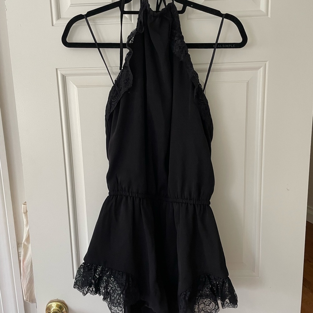 Guess halter top romper with lace detail, size small.